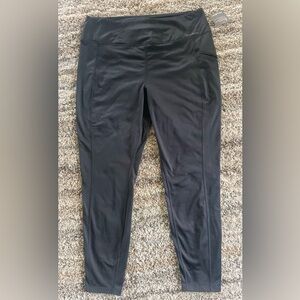 Eddie Bauer stretchy black pants.  Matte black with side pockets.  New with tags